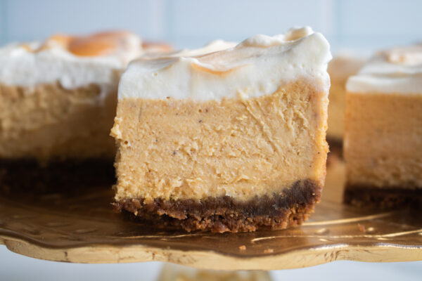 Pumpkin Cheesecake bars with a brown butter gingersnap crust