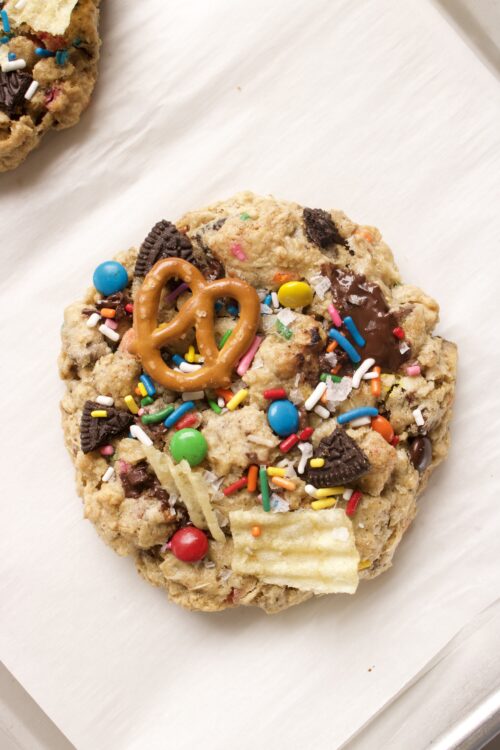 Kitchen Sink Cookies topped with pretzels, chips, and M&Ms