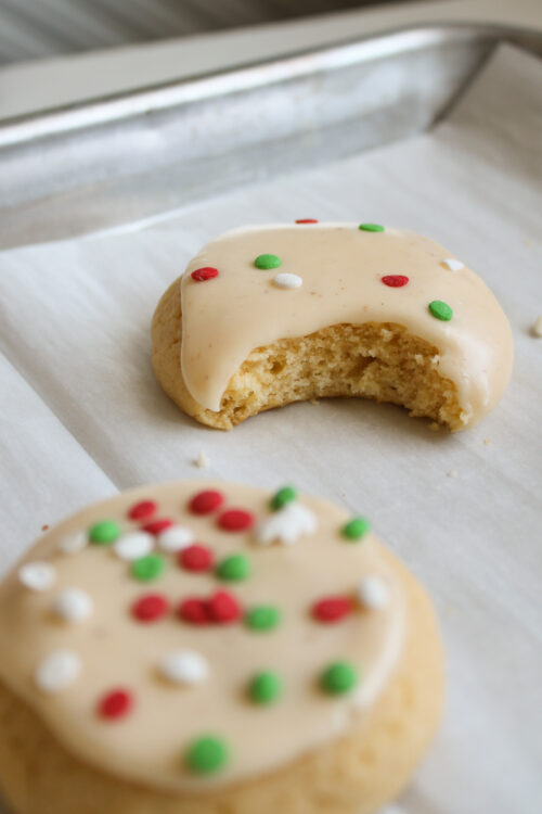 Eggnog Sugar cookie with Christmas Sprinkles with a bite out of it