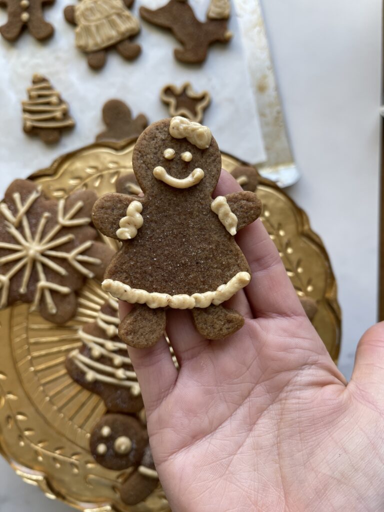 Gingerbread girl with frosting bow