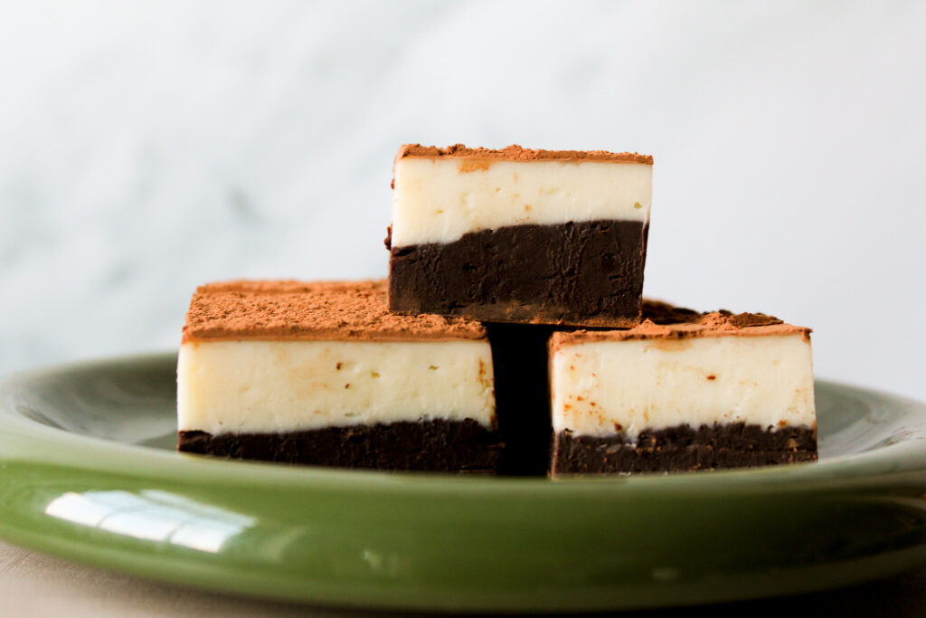 Tiramisu Fudge Bars stacked on a plate