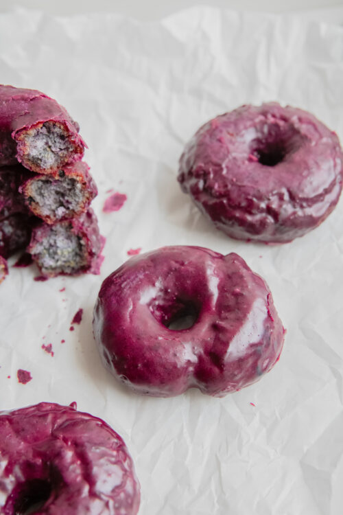 Blueberry Doughnuts on parchment paper