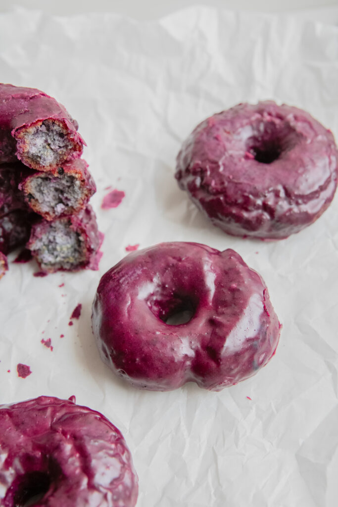 Blueberry Doughnuts on parchment paper
