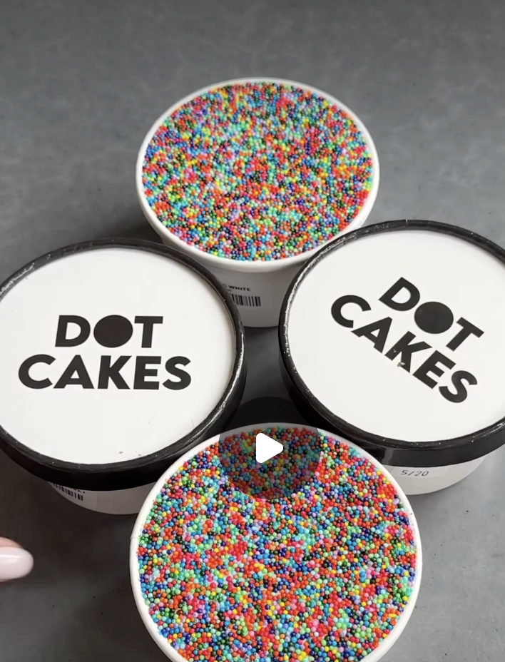 Dot cakes containers from "Dot Cakes Bakery"