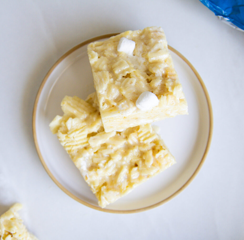 Two potato chip rice krispies on a plate